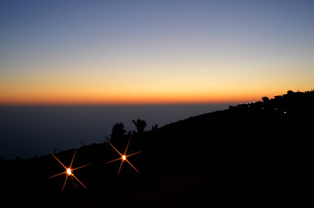 Sunset on the mountain and skyの写真素材