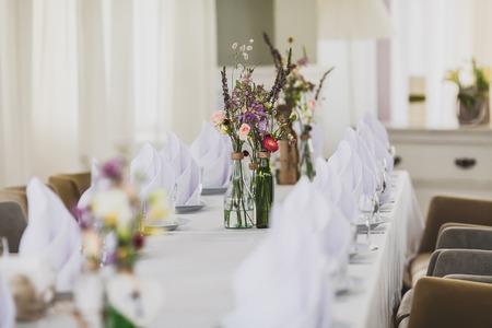 A bouquet in a bottle on the holiday table