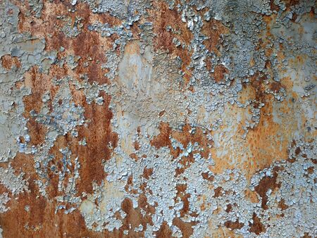 Corroded metal background. Rusty metal background with streaks of rust. Rust stains. Rystycorrosion.