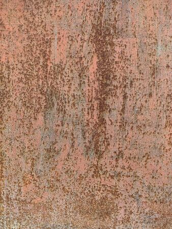 Rusted grey painted metal wall. Rusty metal background with streaks of rust. Corroded metal...