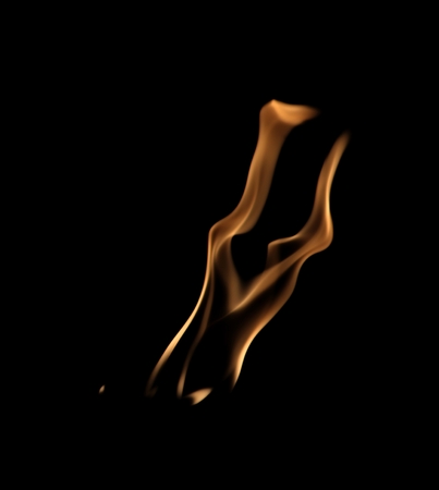 Artistic shapes from the flames of a burning torch with a dark backgroundの写真素材