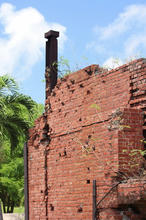 Old Japanese sugar mill by the roadside in Songsong village, Rota.の写真素材
