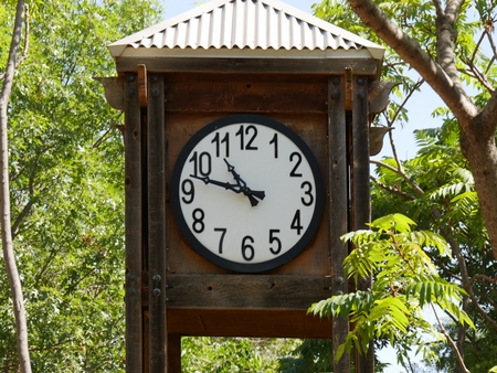 The clock is displayed framed in a zoo park