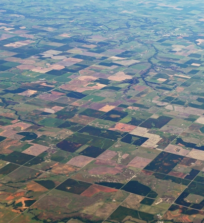 Aerial view of farmlands and colorful landscapes from Oklahoma to Las Vegas, View seen from the...
