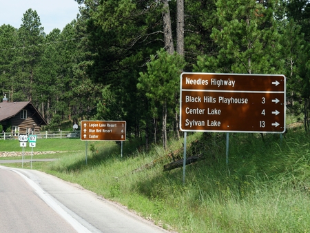 Roadside signs and directional signs at the Custer State Park, South Dakota.のeditorial素材