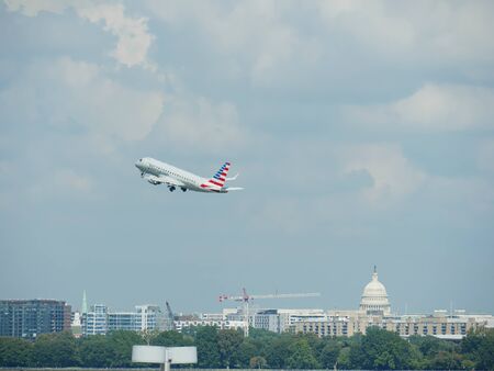 Arlington, Virginia, USA- September 2017: An American Airlines aircraft takes off from the Ronald Reagan National Airport in Arlington, Virginia.のeditorial素材