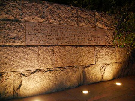 Washington, D.C., USA-September 2017: Famous quotations etched on the walls at the Franklin Delano Roosevelt Memorial at night, Washington, District of Columbia.のeditorial素材