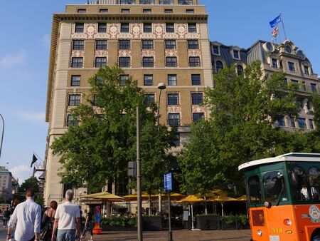 Washington, D.C. USA- September 2017: Street view with people crossing the pedestrian lane, with buildings along Pennsylvania Avenue.のeditorial素材