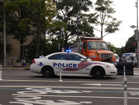 Washington, D.C. USA- September 2017: A police car patrols the street near the Southwest Waterfront in Washington, District of Columbia.のeditorial素材