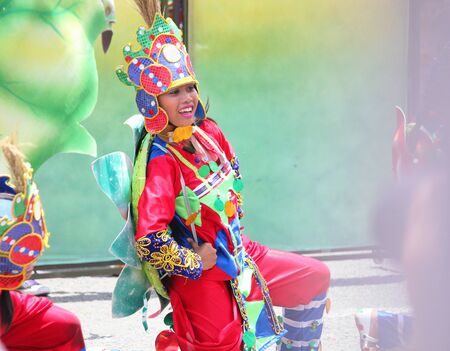 Davao City, Philippines-August 2014: Medium close up of a female street dancer at the Kadayawan festival. Kadayawan is celebrated August each year to give thanks for life and an abundant harvest.のeditorial素材