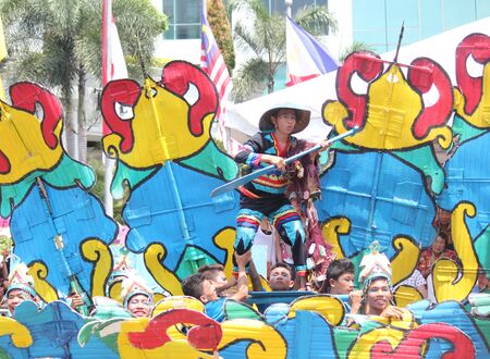 Davao City, Philippines-August 2014:  Festive presentation from one of the streetdancing competition contenders. Kadayawan is celebrated August each year to give thanks for life and an abundant harvest.のeditorial素材