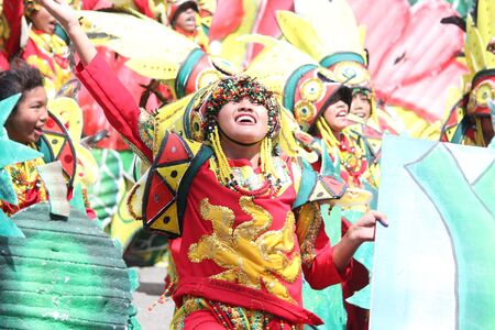Davao City, Philippines-August 2014: Participants of the streetdancing competition at the Indak-indak sa Kadayawan. Kadayawan is celebrated August each year to give thanks for life and an abundant harvest.のeditorial素材
