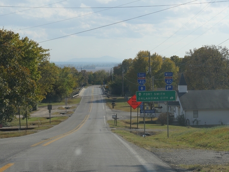 Road signs in Dora with directions to Fort Smith and Oklahoma City.のeditorial素材