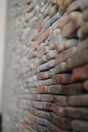 Portrait view of an old brick wall