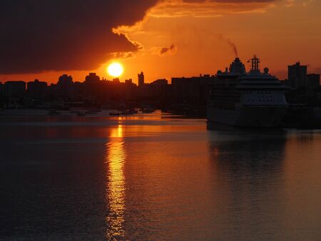 Beautiful sunset reflected in the waters of the harbor in Puerto Rico.の写真素材