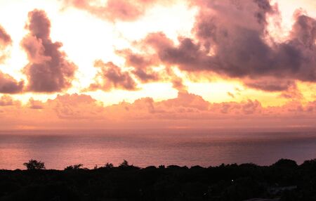 Dramatic cloud formations in the skies over the ocean in Saipan, the Northern Mariana Islands. の写真素材