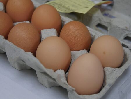 Paper tray of native brown eggs produced in a local farm