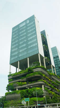 Singapore, Singapore-March 2016: Portrait view of the Parkroyal Hotel known for its iconic green...