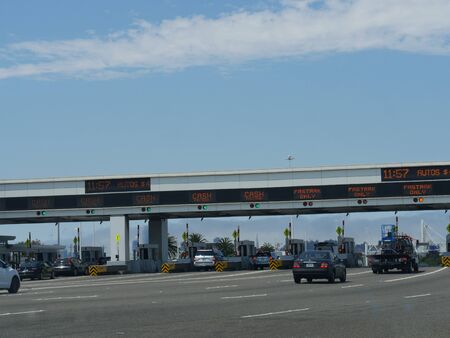 San Francisco, California-July 2018:Wide shot of cars lining up at the toll gates to the Golden Gate...