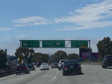 San Francisco, California-July 2018: Wide shot of directional roadside sign to san Jose, Golden Gate...
