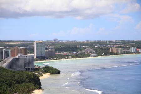 Guam, USA- December 2016: Buildings and scenic coastal view of Tumon seen from the Two Lover's Point on Guam, USA.のeditorial素材