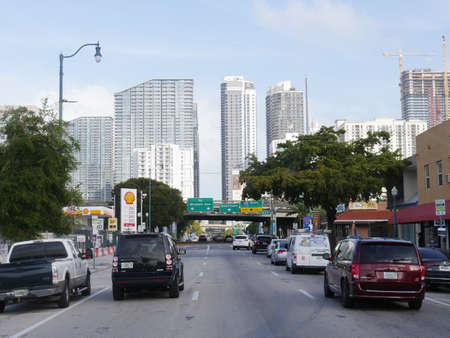 Miami, Florida- December 2018: Street shot in downtown Miami with cars traveling on the road.のeditorial素材