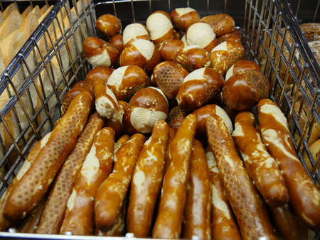 Freshly baked Fougasse bread at a breakfast buffet stationの写真素材