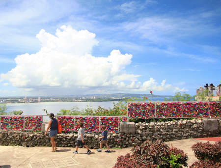 GUAM, USAâTourists visit the Two Loverâs Point or Puntan Dos Amantes in December 2016, a top attraction on Guamのeditorial素材