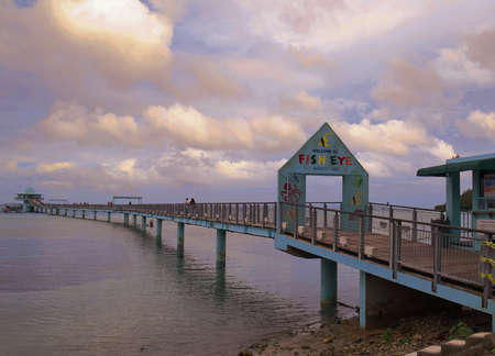 GUAM, USAâLong wooden bridge to the Fish Eye Marine Park, an underwater observatory which is one of the top attractions on Guam in a photo taken in December 2016.のeditorial素材