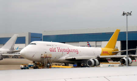HONG KONG, HONG KONGâ€”DECEMBER 2016: An Air Hongkong  aircraft loading cargo at the Hong Kong...