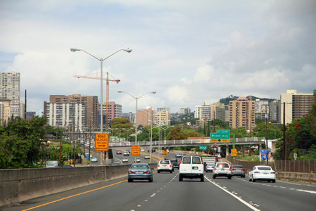 HONOLULU, HAWAIIâ€”AUGUST 2015: Cars traveling along one of the highways of Honolulu, Hawaii on...