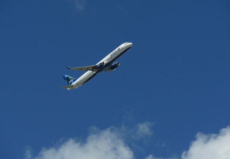 SAN JUAN, PUERTO RICOâMARCH 2017: A JetBlue aircraft takes off from the Luis MuÃ±oz MarÃ­n International Airport in Puerto Rico.のeditorial素材