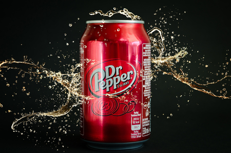 Kyiv, Ukraine - May 28, 2018: Can of Dr Pepper soft cola drink on black background. Dr Pepper is a soft drink marketed as having a unique flavor. The drink was created in the 1880s.のeditorial素材