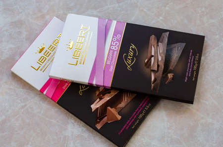Kyiv, Ukraine - March 11, 2020: Chocolate bars Libeert on marble table