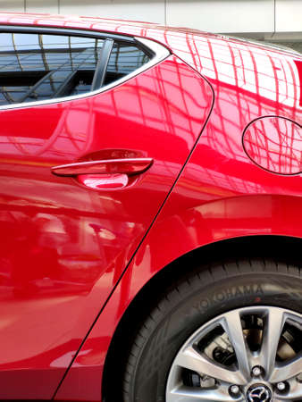 New Red Mazda 3 displayed at auto showのeditorial素材
