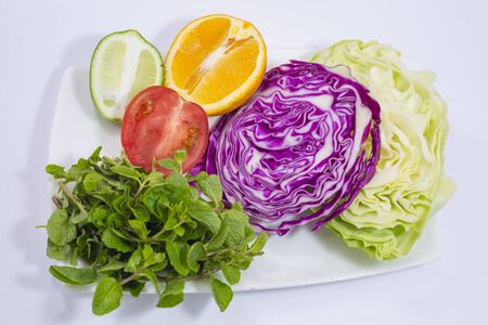 Green fruits and vegetables are loaded with important vitamins and minerals like vitamin A, vitamin C, potassium, and folate, as well as phytochemicals and fiber.Eating a diet rich in green produce can help â¦ Challenge yourself to eat moregreen fruits and vegetables.の写真素材