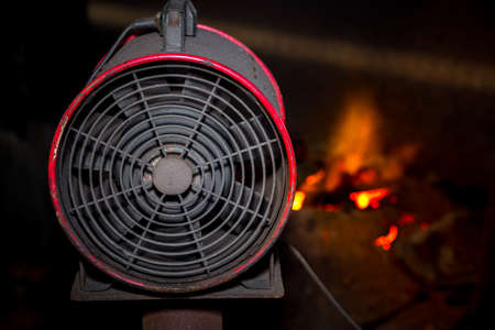 Industrial fan using hot scrap steel melting furnace in a local steel machine parts making yard Bangladesh.のeditorial素材