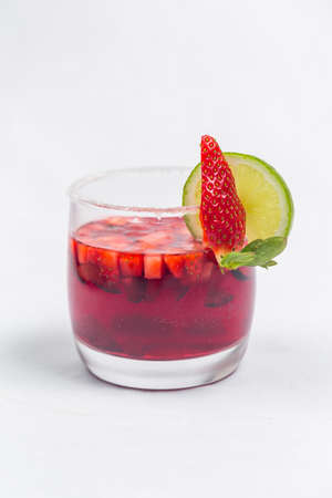 Classic frozen strawberry and lime margarita with fresh strawberries. Valentine's dessert recipe. Strawberry juice.の写真素材