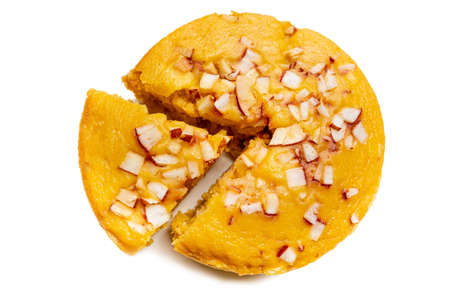 A large-sized ripe palmyra palm fruit cake sprinkled with coconut pieces. Steamed palmyra palm cake...