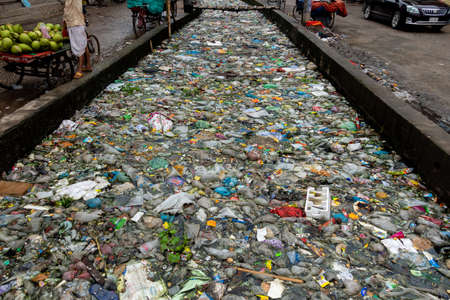 Bangladesh â October 19, 2021: The mouth of the canal is blocked by piles of plastic waste and food waste dumped in the city of Jatrabari, Dhaka.のeditorial素材