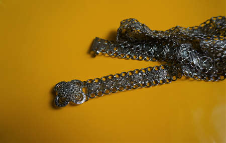 Antique pattern silver belt for women when wearing sarong, then use a belt to prevent the sarong...