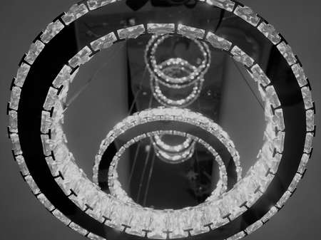 The round lamp is a dazzling white light with contrast black outer edges.の写真素材