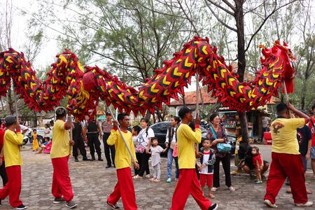 Barongsai and Dragon boat burning. Among Indonesians of Chinese descent, usually held during the Peh Cun Festival, which they will celebrate, Pekalongan/Central Java Indonesia, June 7, 2019のeditorial素材