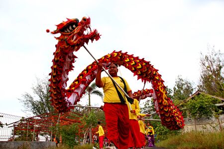 Barongsai and Dragon boat burning. Among Indonesians of Chinese descent, usually held during the Peh Cun Festival, which they will celebrate, Pekalongan/Central Java Indonesia, June 7, 2019のeditorial素材