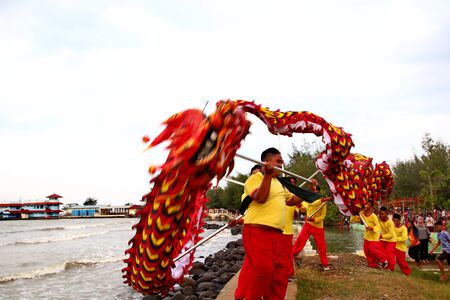Barongsai and Dragon boat burning. Among Indonesians of Chinese descent, usually held during the Peh Cun Festival, which they will celebrate, Pekalongan/Central Java Indonesia, June 7, 2019のeditorial素材