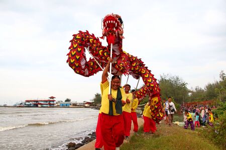 Barongsai and Dragon boat burning. Among Indonesians of Chinese descent, usually held during the Peh Cun Festival, which they will celebrate, Pekalongan/Central Java Indonesia,のeditorial素材