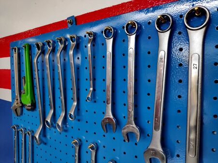 work table in a workshop and toolsの写真素材
