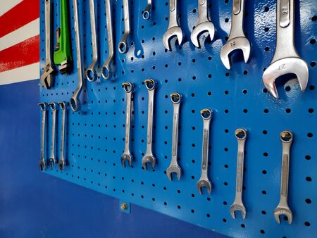 work table in a workshop and toolsの写真素材