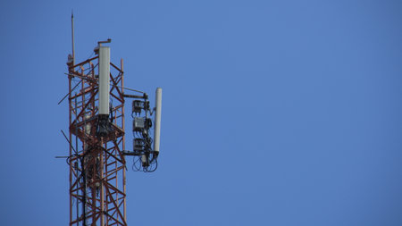 Mobile phone Telecommunication Radio antenna Tower. Cell phone tower with blue sky background