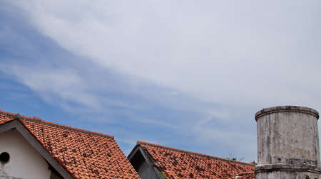old chimney from the brick of a dilapidated house